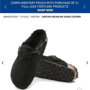 Birkenstock Black Slippers with Soft Lining and Textured Sole